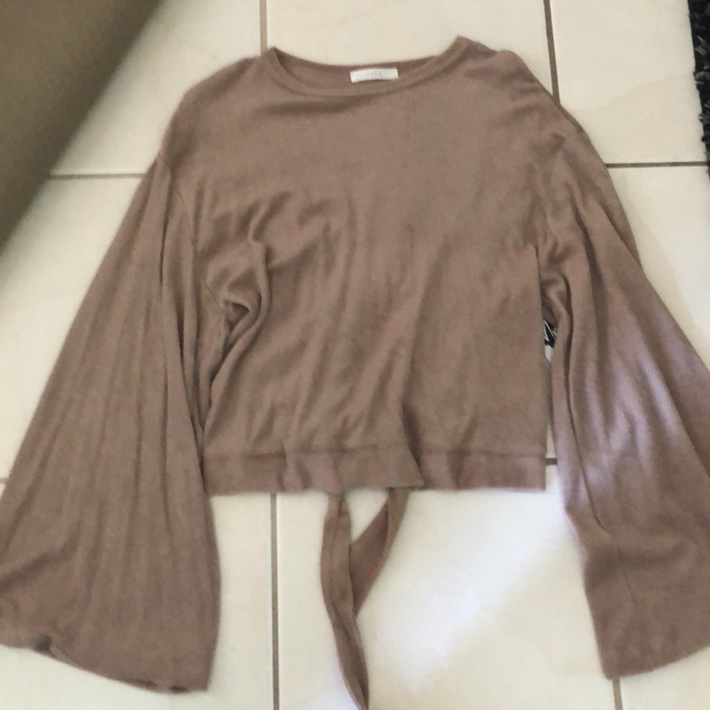 Cut out back detail. Crop belle sleeve sweater